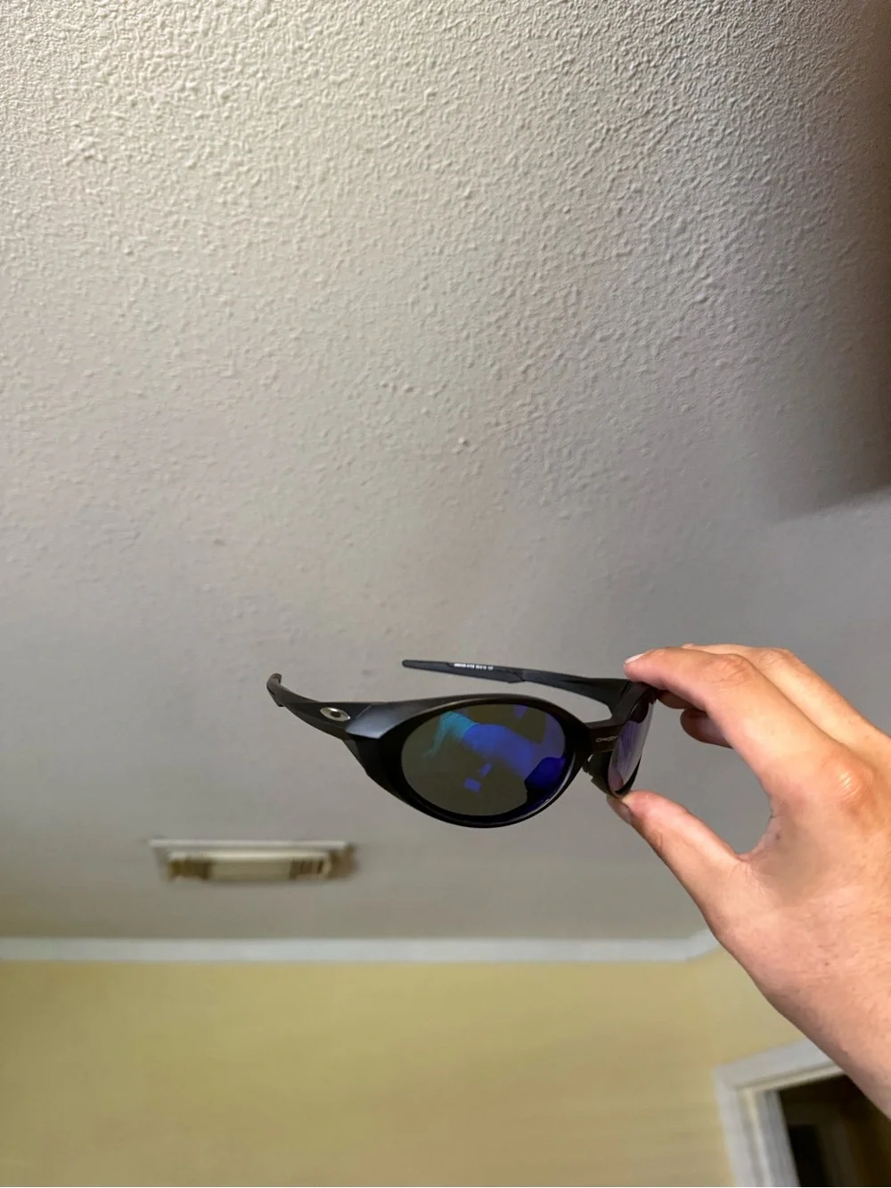 Black Sunglasses with Blue Mirrored Lenses Oakley